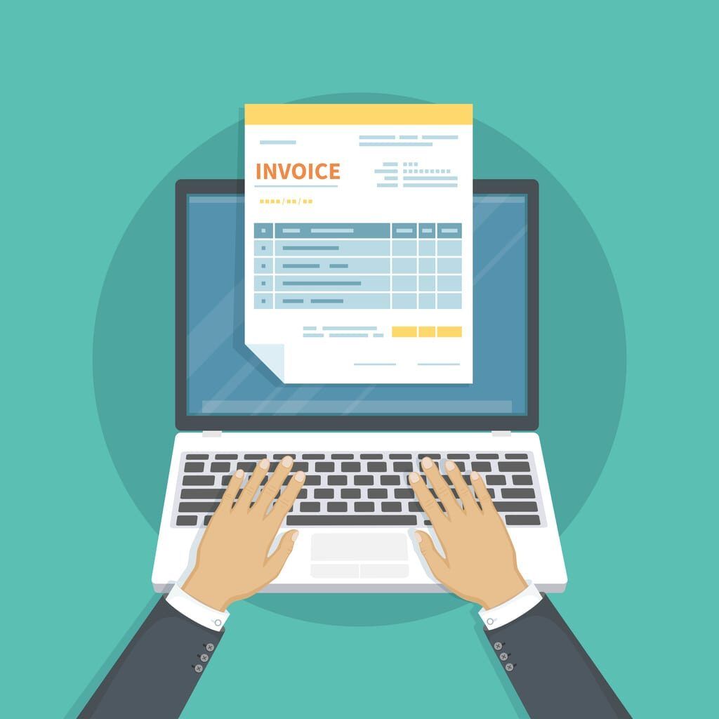 A person managing factored invoices on a laptop computer to reconcile in QuickBooks.