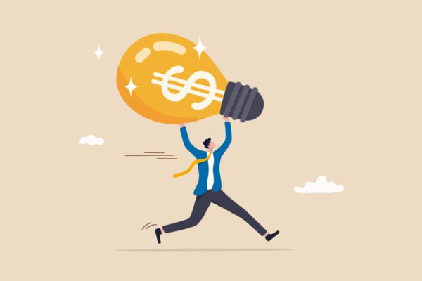 Make money from new idea or profit from investment, creativity or innovation to increase earning growth, financial idea concept, happy businessman carrying bright lightbulb idea with dollar money sign