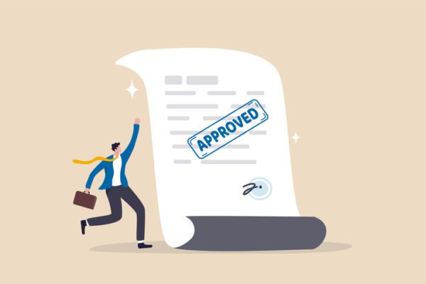 Document approved, business paperwork approval with rubber stamp and signature sign, request accept or legal certified document concept, happy businessman with document paperwork with approved stamp to secure financing.