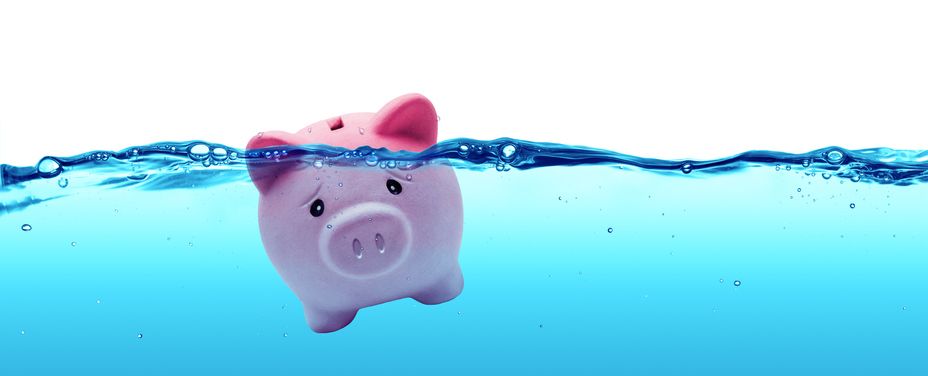 Piggy bank drowning in water