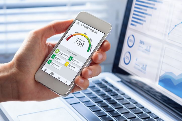 Credit Report with Score rating app on smartphone screen showing creditworthiness to establish and build business credit.