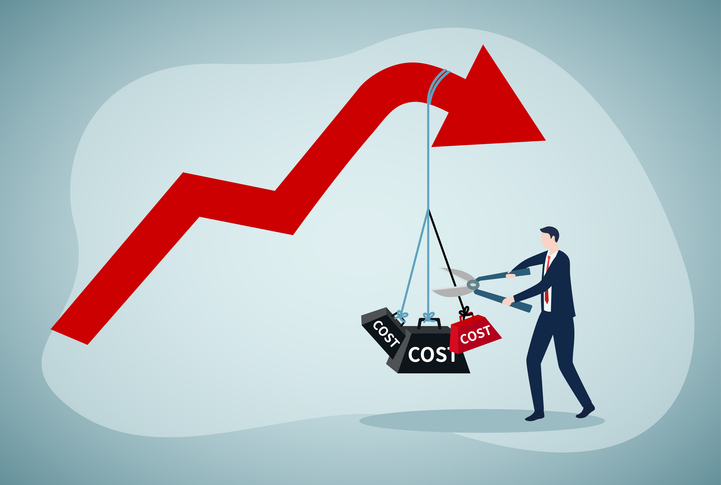 Cost reduction, cut expense to increase profit, improve business profitability. Businessman using scissors to cut heavy cost burden and let profit arrow up.